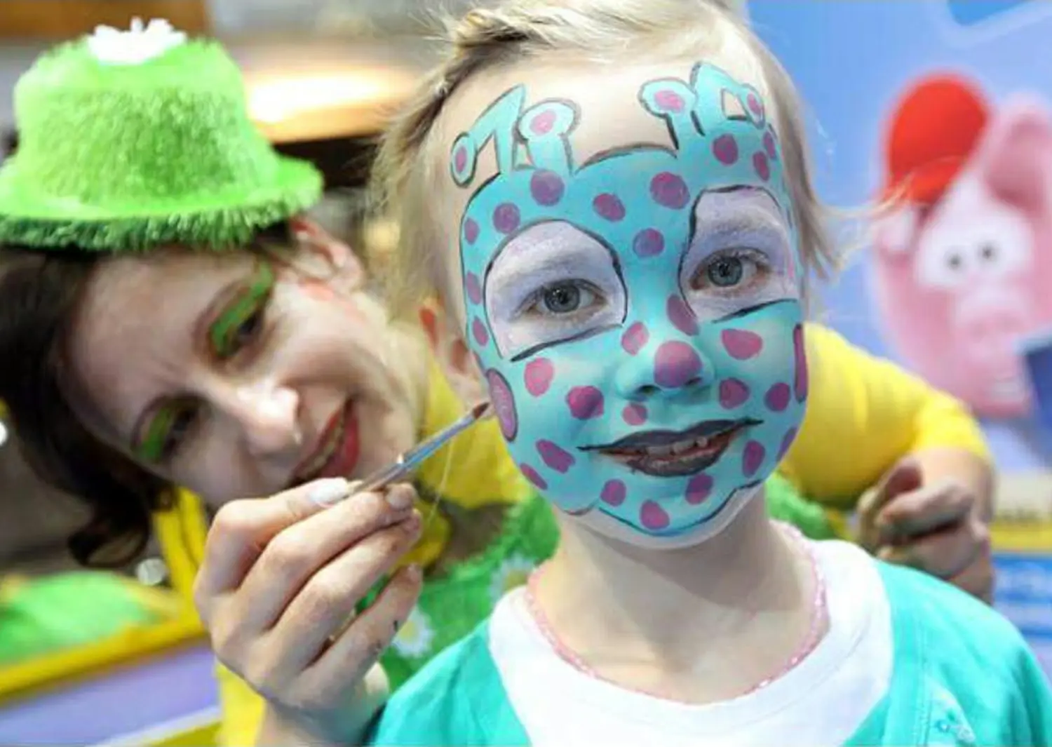 Moments Veranstaltungsagentur - Monster-Kinderschminken in Türkis